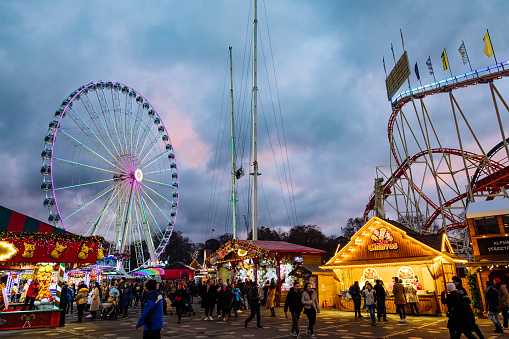 Christmas themed colourful amusement park and Christmas market Winter Wonderland in Hyde Park, London, UK in 2021. Destination open from November to January