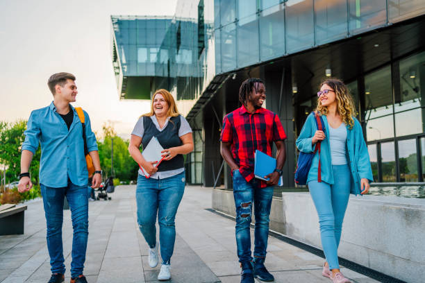 istock Friends walking to university 1356539432
