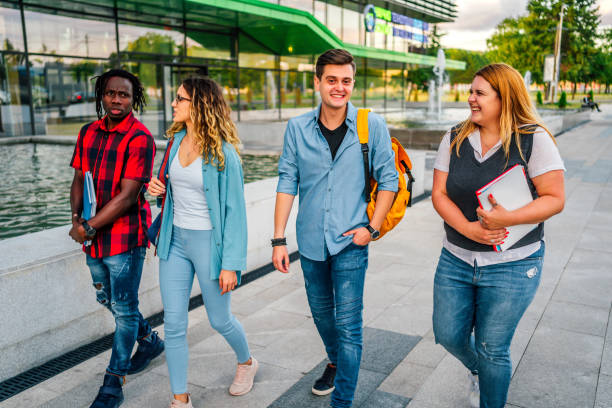 istock Friends walking to university 1356540520