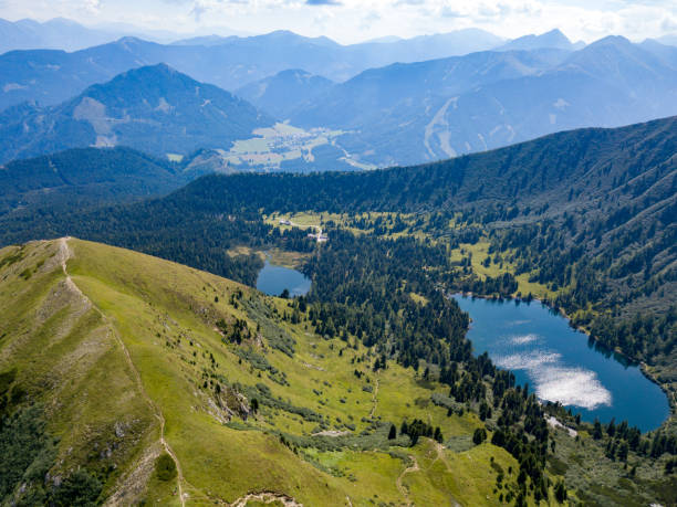 istock Drone view on lake Scheibelsee at Hauseck in Styria, Austria 1356541595