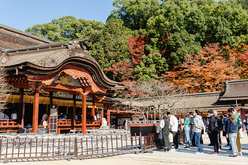 Nov 2021 - Fukuoka,Japan: People queuing up to make a prayer at the Dazaifu Tenmangu Shrine, the most famous and ancient shrine in Fukuoka.