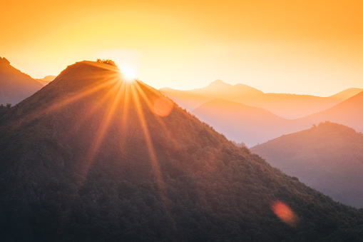 Fog lifts off from distant mountain ranges, in the Pyrenees