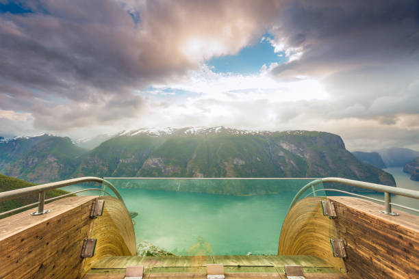 Fjord and Stegastein lookout in Norway Tourism and travel. Scenic view of the Aurland fjord landscape from Stegastein lookout, Norway Scandinavia. stegastein viewpoint stock pictures, royalty-free photos & images