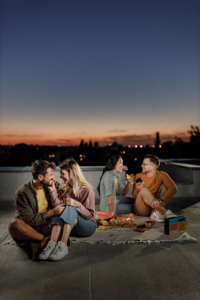 istock Picnic on a roof at dusk! 1356546653