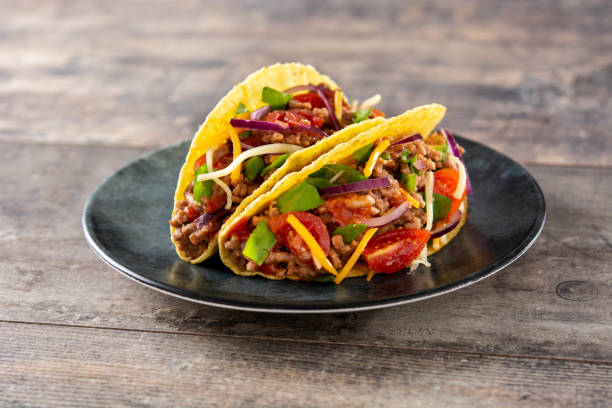 istock Traditional Mexican tacos with meat and vegetables 1356548924