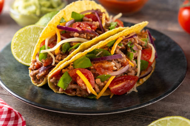 istock Traditional Mexican tacos with meat and vegetables 1356548935