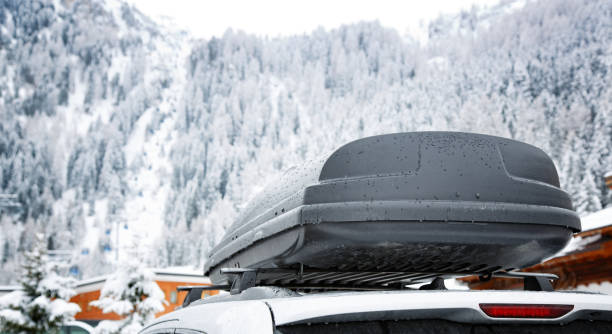 Roof rack with cargo box in winter stock photo