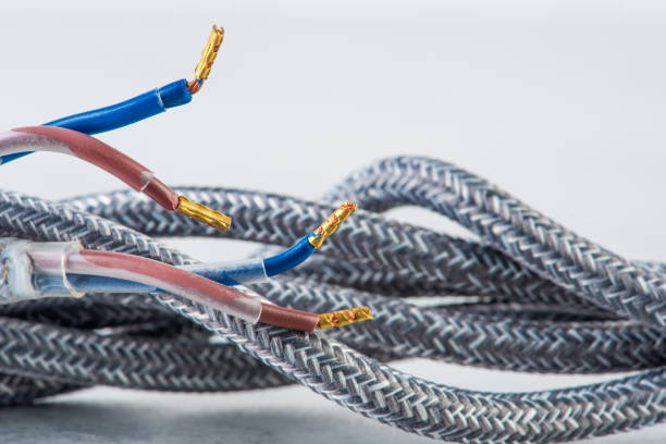istock Fabric braided cable used in electrical wiring installation 1356550857