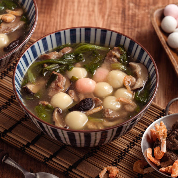 istock Red and white tangyuan with savory soup. 1356552821