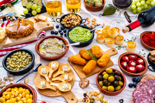 istock Table full of Spanish tapas, beer and wine 1356554222
