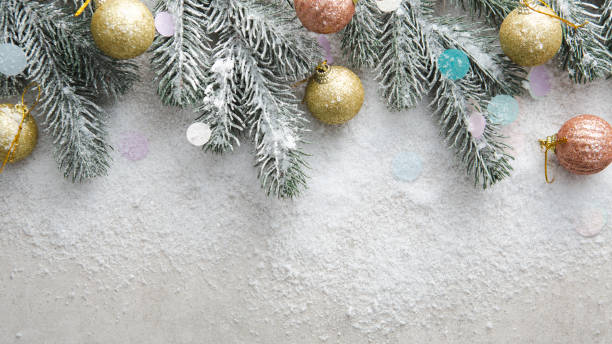 istock Christmas concept background spruce and snow tree decorations top view 1356554547