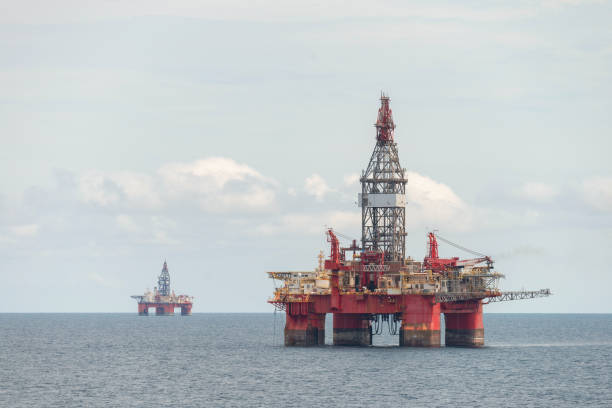 istock Offshore jack up rig in the middle of sea 1356555565