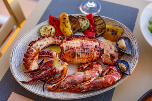 istock Dish with a variety of seafood 1356559050