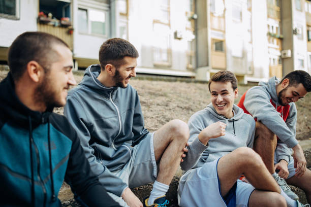 istock Friends playing basketball outside 1356561160