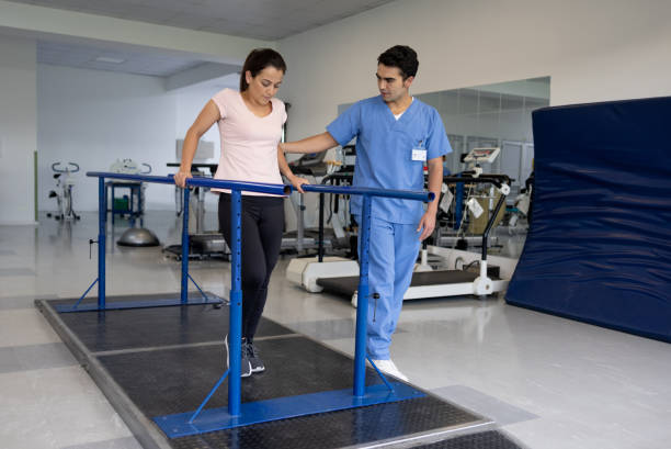 istock Woman doing physical therapy after an injury 1356562159