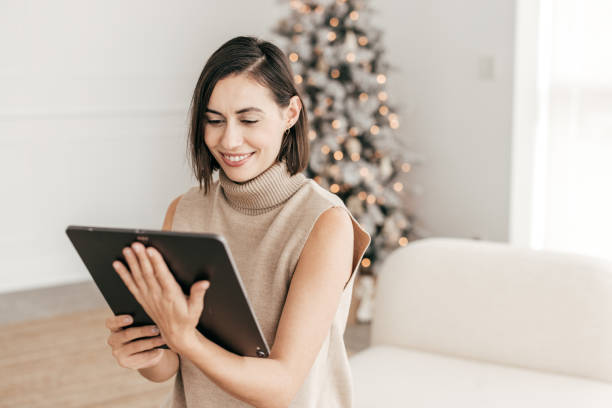 istock Woman and  her online shopping with tablet 1356562373