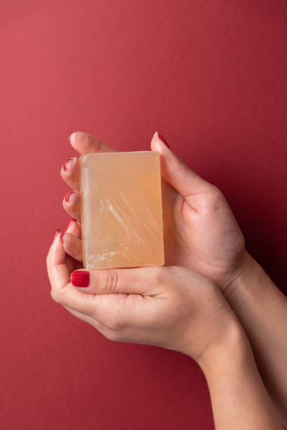 istock Feminine hands showing soap on copy space 1356562468
