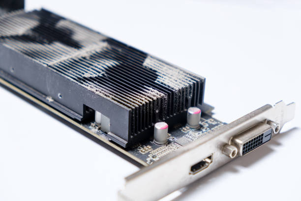 istock Dirty dusty graphics card in dust on a white background 1356564661