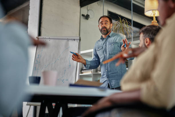 istock A business executive making a presentation of his proposal. 1356568475
