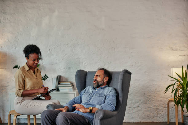 istock Man having a therapeutic session with a psychologist 1356568500