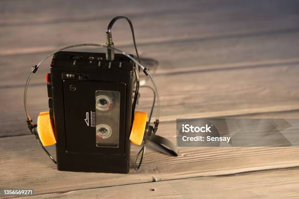 Vintage Sony Walkman audio cassette player.A cassette player with Sony  speakers on a wooden table. Use only under the Editorial license. Stock  Photo