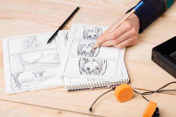 istock Artist drawing an anime comic book in a studio. 1356569921