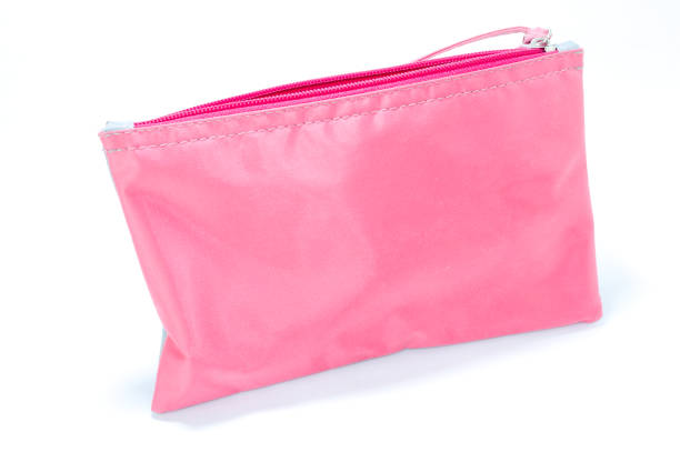 istock Pink bag with zipper and white background 1356571288