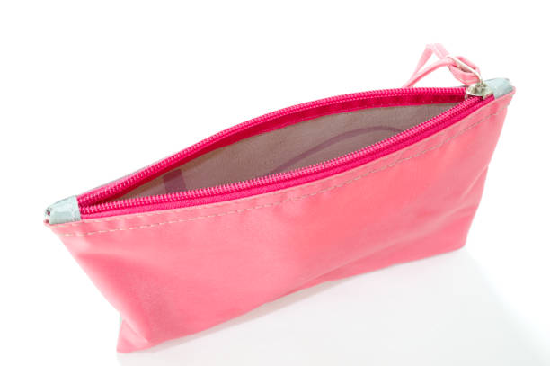 istock Pink bag with zipper and white background 1356571291