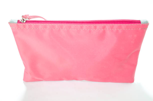 istock Pink bag with zipper and white background 1356571314