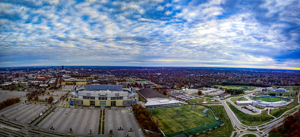 Lexington, Kentucky USA - November 25 2021: Landscape and dramatic clouds above University of Kentucky's sports fields and Kroger Field Stadium