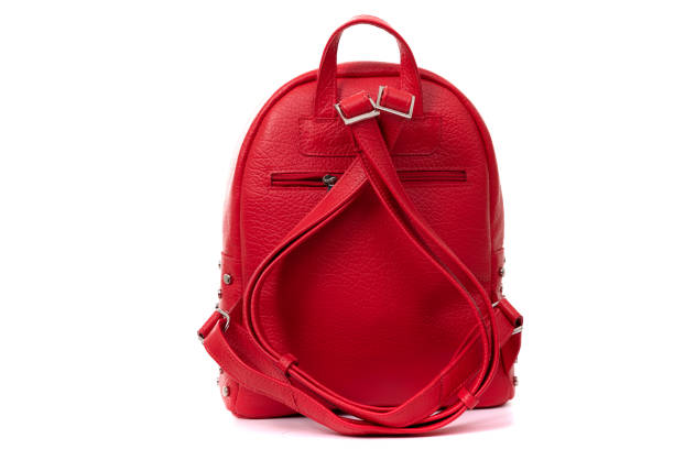 istock red backpack made of genuine leather on white isolated background, back view 1356578916