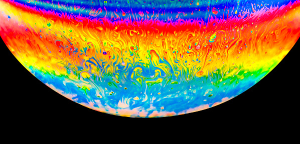 Rainbow colors created by soap bubble for background