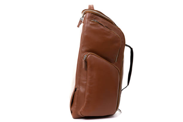 istock light brown backpack made of genuine leather on a white background, side view 1356579687
