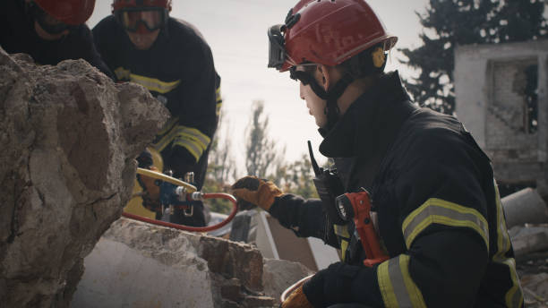 istock Male rescuer speaking with colleagues 1356579929