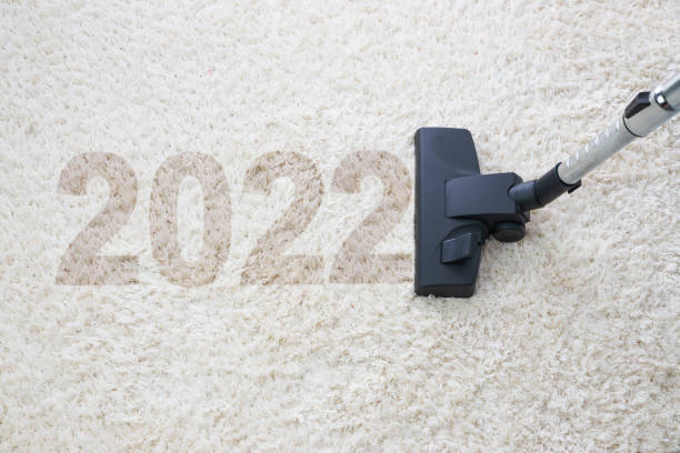 istock Home cleaning with vacuum cleaner and copy space for a text, new year 2022 1356580932