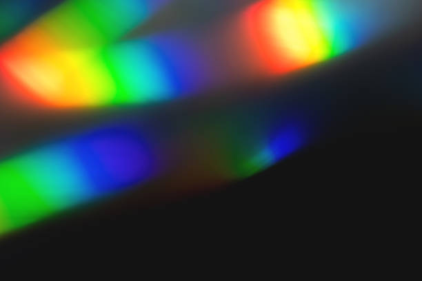 istock colorful rainbow crystal light leaks on black background 1356581113