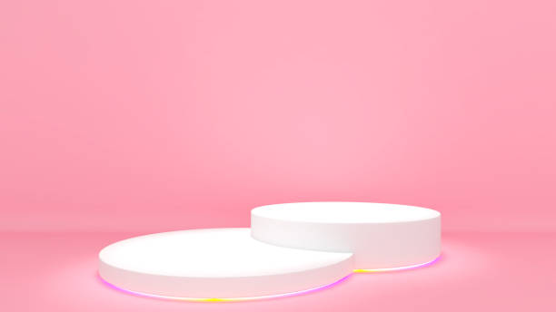 istock white stand on a light pink background,mock up podium for product presentation 1356581310