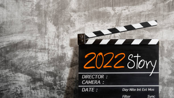 istock 2022 story.Text title on film slate. 1356583053