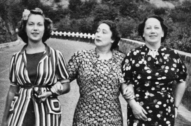 istock Three Women Walking in a Road. 1938. 1356583200