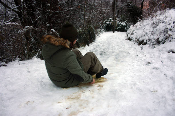 istock sledding along a trail covered with white snow in the mountains in winter or maybe cold spring 1356587881