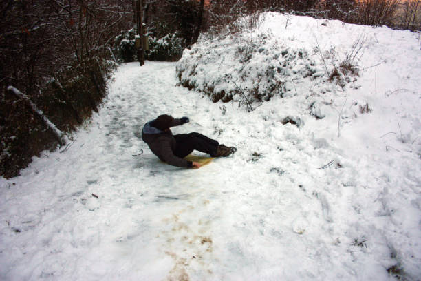 istock sledding along a trail covered with white snow in the mountains in winter or maybe cold spring 1356590460