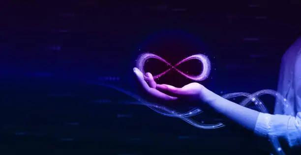 Metaverse Technology concepts. Hand holding virtual reality infinity symbol.New generation technology.Global network technology and  innovation