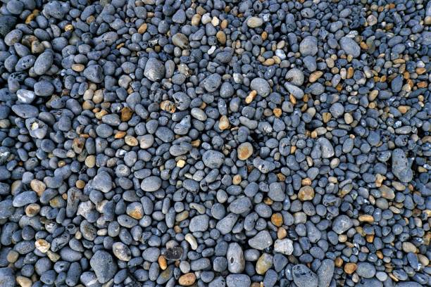 istock grey pebbles of a rocky beach 1356591409