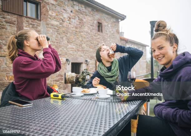 Friends Enjoy A Hot Beverage Together Stock Photo - Download Image Now - Walkie-talkie, Females, Fun