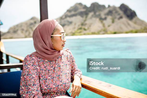 Sadness Muslim Woman Taking Adventure In Komodo Island Stock Photo - Download Image Now