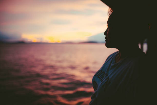 silhouette asian woman on the beach