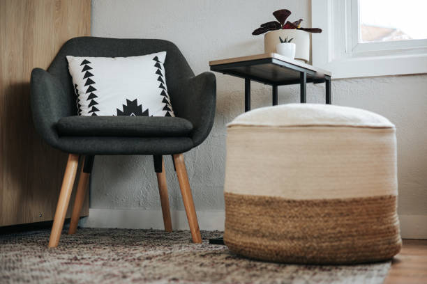 istock Chair and Ottoman in Office Space with Natural Light 1356603160