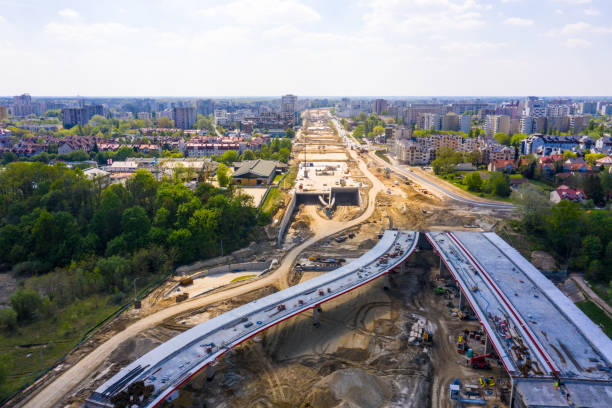 construction of new road at suburb area. aerial top view on indu stock photo