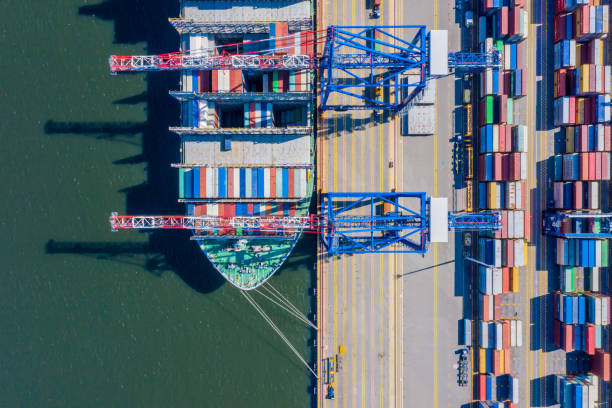 istock Container ship in import export and business logistic, By crane, 1356606197
