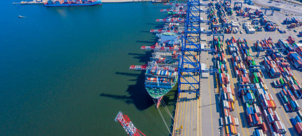 istock Container ship in import export and business logistic, By crane, 1356606255